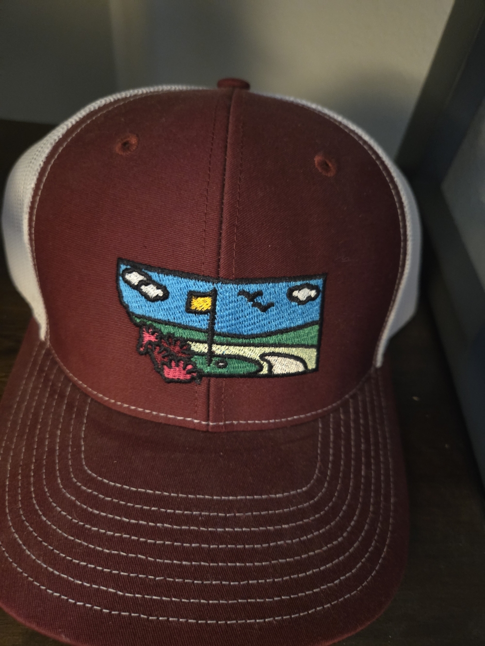 Maroon and White Trucker Hat with Golf Patch